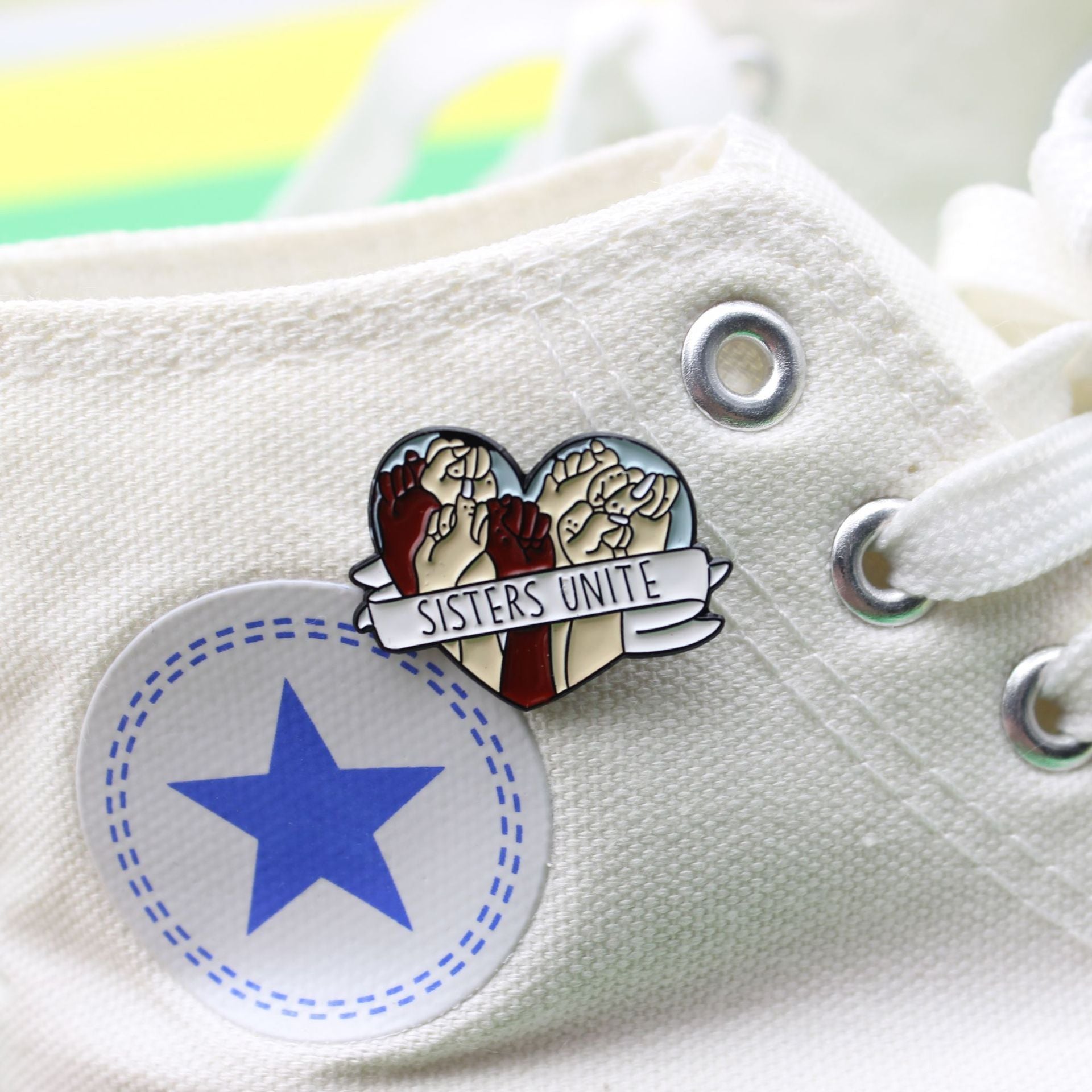 Heart-Shaped Ribbon Wrapped Around a Fist Brooch